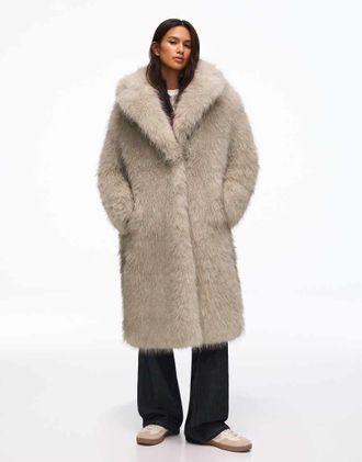 Bershka Cappotto lungo in pelliccia beige-Neutro