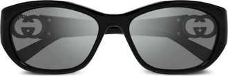 Gucci Occhiali da sole ovali con logo GG - Nero