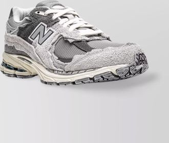 New Balance paneled low-top sneakers