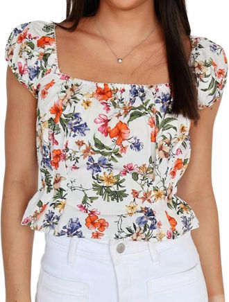 Olivaceous Arden Peplum Top In White/orange Floral