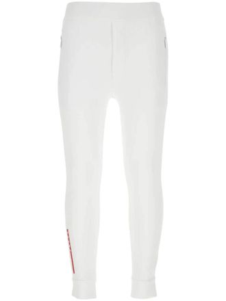 Prada logo-print skinny trousers - men - Elastane/Recycled Polyester - L - White