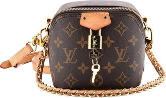 Louis Vuitton Just in Case Shoulder Bag Monogram Coated Canvas crossbody bag - Bruin
