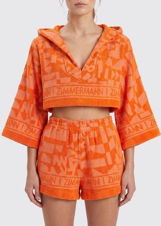 Zimmermann Top cropped Solstice in cotone a maniche lunghe con cappuccio
