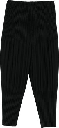 Homme Pliss&eacute; Issey Miyake pleated trousers - Black