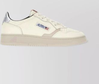 Autry leather sneakers with rubber sole and perforated toe cap