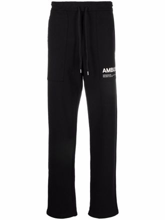 AMBUSH logo-print track pants - men - Cotton - S - Black