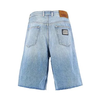Dolce & Gabbana Denim shorts with logo plate Man 50