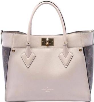 Louis Vuitton Pre-owned On My Side - Dames - Vintage Handtas - Beige - ONE Size - Leer - Vintage