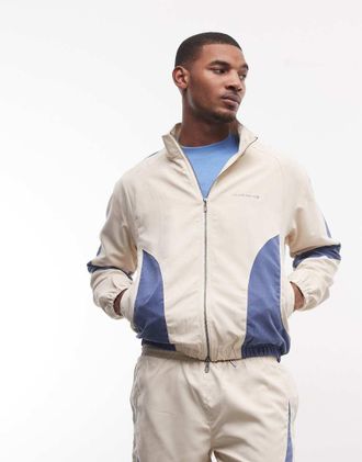 Alma de Ace Pexa - Giacca sportiva bianca e blu con pannelli in coordinato-Bianco