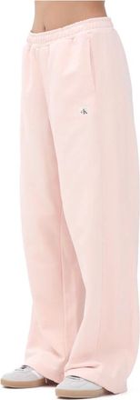Calvin Klein Jeans Broeken, Dames, Roze, S, Roze sportieve broek met wijde pasvorm
