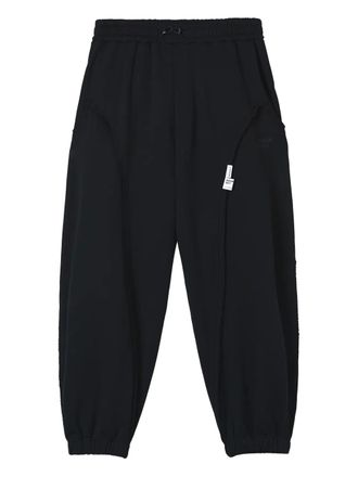 Musium Div. cotton track pants - men - Cotton - 32 - Black