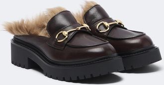 Gucci Mules con plataforma Rhody de piel con borrego