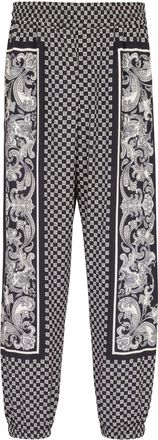 Balmain monigram-print elasticated-waistband track pants - men - Viscose - 52 - Black