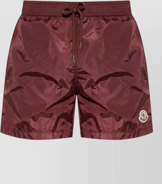 Moncler logo swim shorts elasticated waistband stripe detail