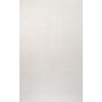 Jonathan Y Designs Haze Solid Low-Pile Area Rug in Ivory at Nordstrom, Size 3Ft 0In X 5Ft 0In