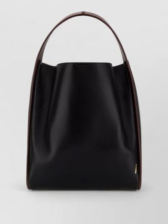 Jil Sander pivot leather bucket bag contrast trim handle