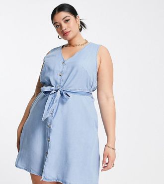 Vero Moda Curve button through denim mini dress with tie waist in light blue