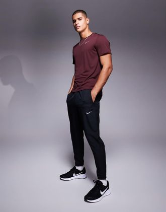 Nike Challenger woven sweatpants in black