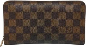 Louis Vuitton Pre-owned Lange Portemonnee (bi-fold) - Dames - Vintage Accessoires - Bruin - ONE Size - Leer - Vintage