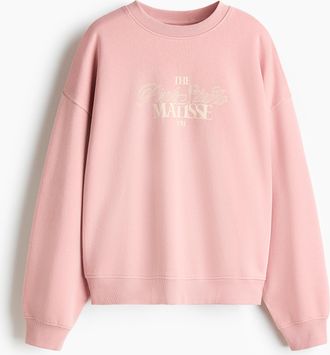 H&M Oversized Sweatshirt mit Printmotiv - Pink