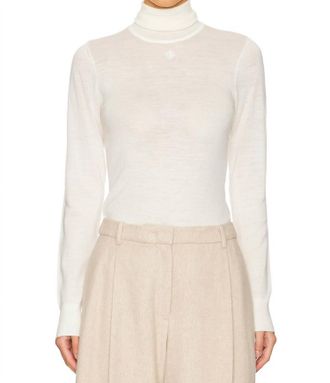 The Garment Bergen Turtleneck Blouse In Cream