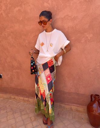 Never Fully Dressed Maeva gonna maxi in raso taglio sbieco con dettaglio in pizzo verde stampa patchwork-Multicolore