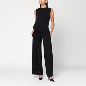 Alaia Full jumpsuit with a belt at the waist