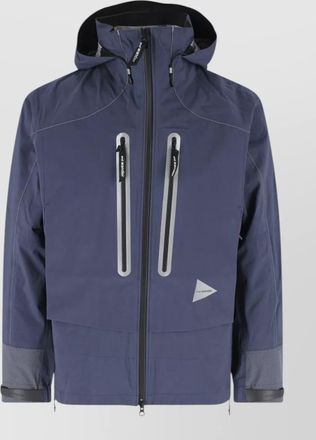 And Wander raincoat