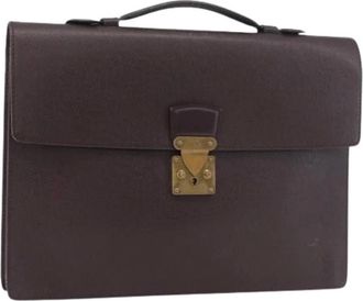 Louis Vuitton Pre-owned Handbags, female, Brown, Size: ONE SIZE Pre-owned Taiga Business Bag