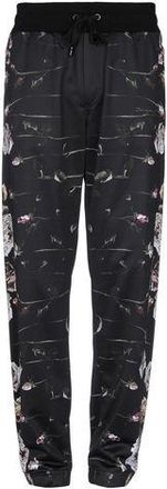 Dolce & Gabbana PARTES DE ABAJO - Pantalones en YOOX.COM