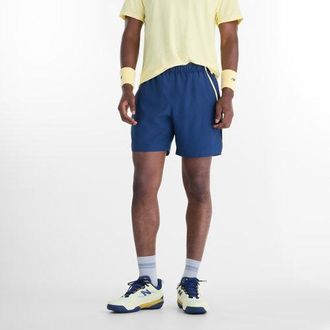 New Balance Hombre Tournament NYC Short en Azul/Amarillo, Polywoven, Talla XL