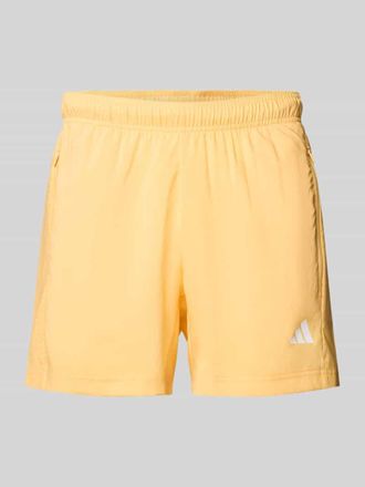adidas Regular Fit Sport-Shorts mit Label Print in Orange, Gr&ouml;&szlig;e XXL
