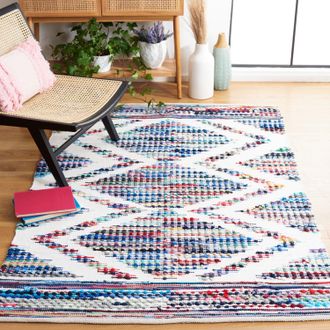 Safavieh Montauk Machine Made Area rug, Ivory / Blue Bohemian Style Easy Care