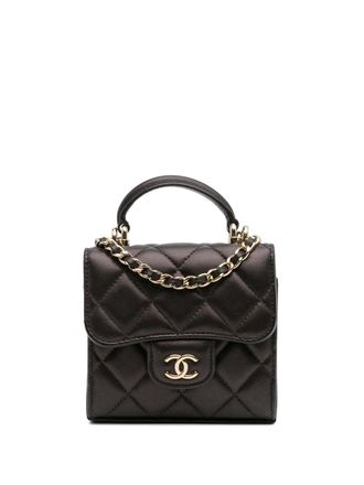 Chanel 2021-2025 CC gewatteerde iriserende lamsleren tas met handgreep en ketting - Rood