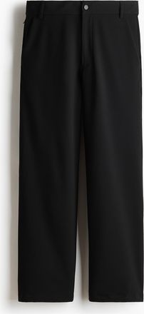 H&M Chinos mit Vierwegestretch in Loose Fit - Schwarz