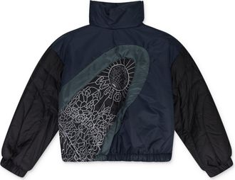 Who Decides War by Ev Bravado Indigo Diagonal Glass Puffer Jacket