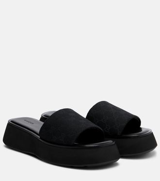 Gucci Sandalias con plataforma de lona GG