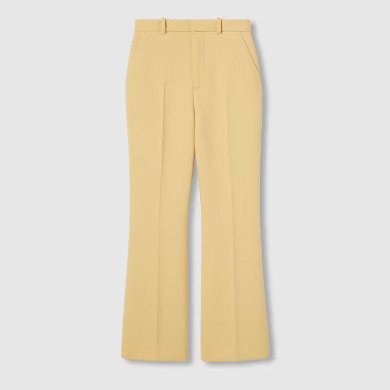 Gucci Cream coloured wool crêpe trousers from $1,108.40 - on