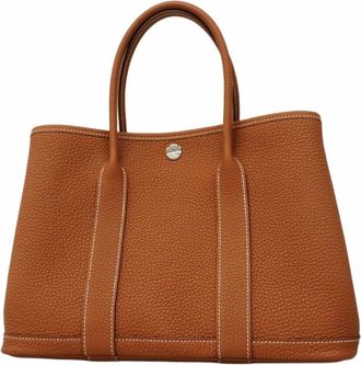 Herm&egrave;s Gold Negonda Leather Tote Bag (Pre-Owned)
