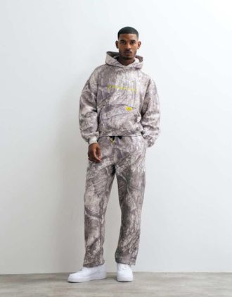 Nike Jordan Real Tree joggers a gamba larga stampati beige-Neutro