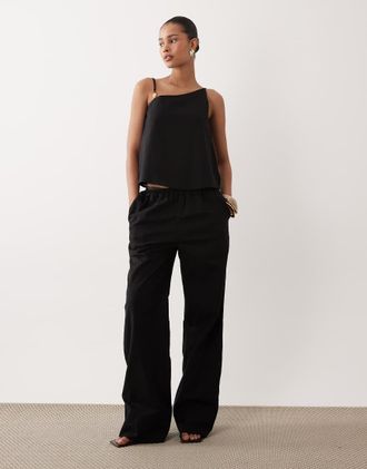 SNDYS Pantaloni a fondo ampio in misto lino neri con vita elasticizzata in coordinato-Nero