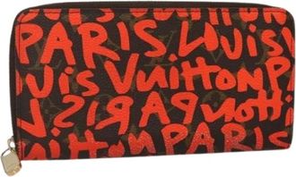 Louis Vuitton Pre-owned Wallets, female, Orange, Size: ONE SIZE Pre-owned Canvas Wallet