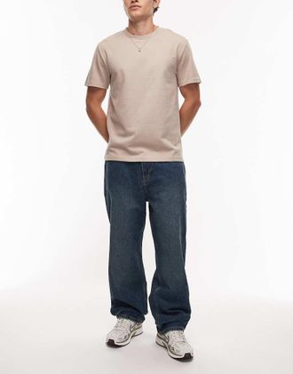 Timberland Jeans larghi blu lavaggio medio con logo sulla tasca