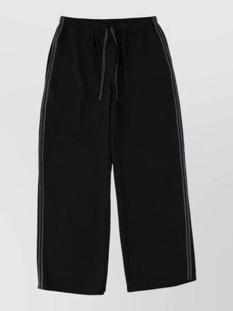 Filippa K tailored trousers featuring refined side stripes