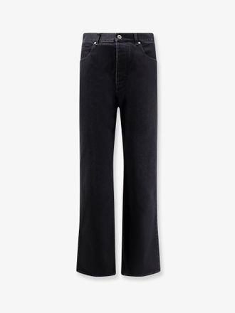 Bottega Veneta Pantaloni in black denim con patch posteriore in pelle - BOTTEGA VENETA - gender_Man
