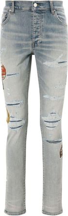 Amiri Travel Patch Repair skinny jeans - men - Cotton/Elastomultiester/Elastane/Polyester - 38 - Blue