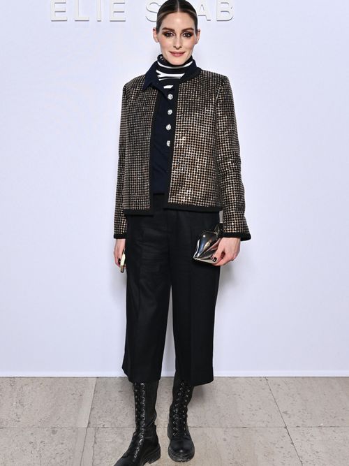 olivia palermo wearing black pants, blazer and combat boots