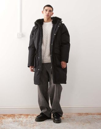 Weekday Parka oversize nero con cappuccio in pelliccia sintetica