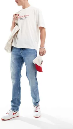 Tommy Jeans Ryan regular straight jeans in light wash-Blue