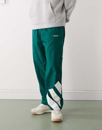 adidas Originals adicolor - Pantaloni sportivi verde college e bianchi a blocchi